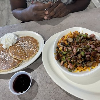 Jonny Cakes Cafe - Canton Skillet modified with no egg and no gravy. Side of pancakes and berry syrup! - Breakfast & Brunch Near Me - Canton, Michigan Jonny Cakes Cafe - Canton Skillet modified with no egg and no gravy. Side of pancakes and berry syrup! - Breakfast & Brunch Near Me - Canton, Michigan