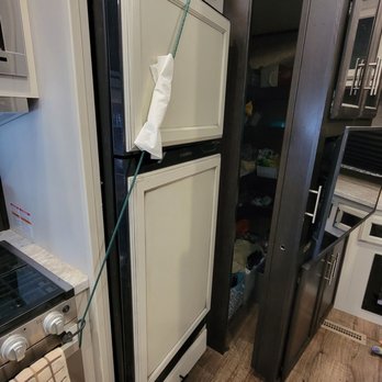 Advanced Rv - What I first noticed. We were using bungies to keep freezer closed at first. Now know why the freezer was not shutting properly. - RV Repair Near Me Advanced Rv - What I first noticed. We were using bungies to keep freezer closed at first. Now know why the freezer was not shutting properly. - RV Repair Near Me