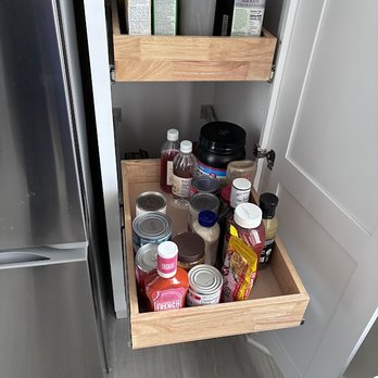 Fina Cabinets LLC - We added pullout drawer shelves in the pantry cabinet, so we can reach stuff in the back now. - Kitchen & Bath Near Me