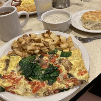 The Big Biscuit - Veggie Omelette with biscuit and side of gravy - American Near Me - Liberty, Missouri The Big Biscuit - Veggie Omelette with biscuit and side of gravy - American Near Me - Liberty, Missouri
