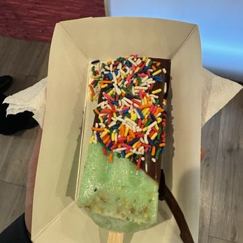 J & J Sweets - Pistachio ice cream dipped in chocolate and sprinkle - Ice Cream & Frozen Yogurt Near Me - Rosemount, Minnesota
