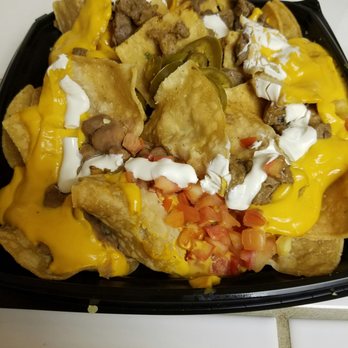 Del Taco - Macho Nacho with Where did the Carne Asada go ... pathetic ration of meat. - Mexican Near Me - Elk Grove, California Del Taco - Macho Nacho with Where did the Carne Asada go ... pathetic ration of meat. - Mexican Near Me - Elk Grove, California