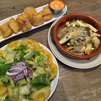 La Paella - Ensalada de la Casa (House Salad), Oyster Mushrooms with Garlic & Olive Oil, Deep Fried Mediterranean Sea Bass (Andalucia Style) - Spanish Near Me - Toronto, Ontario