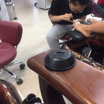 C T Nails - Base of broken remote on armrest - Nail Salons Near Me - North Miami, Florida