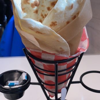 Shamshiry - Tower of bread, butter, and green sauce - Middle Eastern Near Me - Vienna, Virginia Shamshiry - Tower of bread, butter, and green sauce - Middle Eastern Near Me - Vienna, Virginia