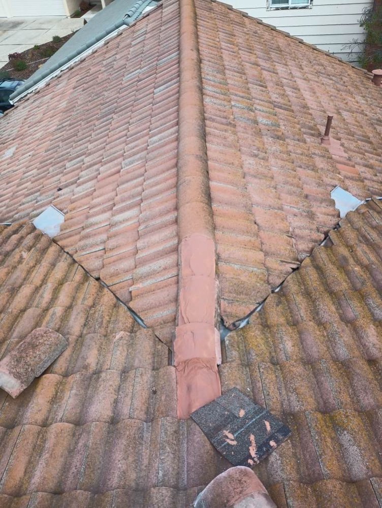 Slide of GT Roofing Services