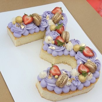 Butter Cakery - Vanilla cake, buttercream, icing, lemon-flavored macaroon with fresh strawberries - Cupcakes Near Me - Natchez, Mississippi