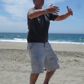 Qiworks - holding the Qi-ball - Massage Therapy Near Me - San Jose, California
