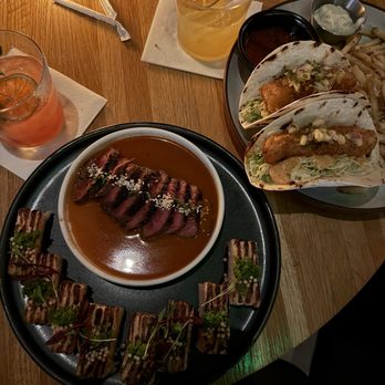 Earls Kitchen + Bar - Baja Fish Tacos steak Aburi Salmon Sushi Press Steak Frites (4oz) Truffle Fries - Cocktail Bars Near Me - Plano, Texas
