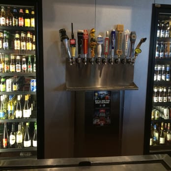 Stadium Grill - a bar with beer taps on the wall - Sports Bars Near Me - Columbia, Missouri Stadium Grill - a bar with beer taps on the wall - Sports Bars Near Me - Columbia, Missouri