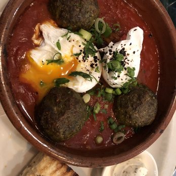 Medina Cafe - Moroccan meatballs. I was warned it's a bit spicy, but it was PERFECT. Look at the way the egg ran when I cut into it! Yum! - Breakfast & Brunch Near Me - Vancouver, British Columbia Medina Cafe - Moroccan meatballs. I was warned it's a bit spicy, but it was PERFECT. Look at the way the egg ran when I cut into it! Yum! - Breakfast & Brunch Near Me - Vancouver, British Columbia