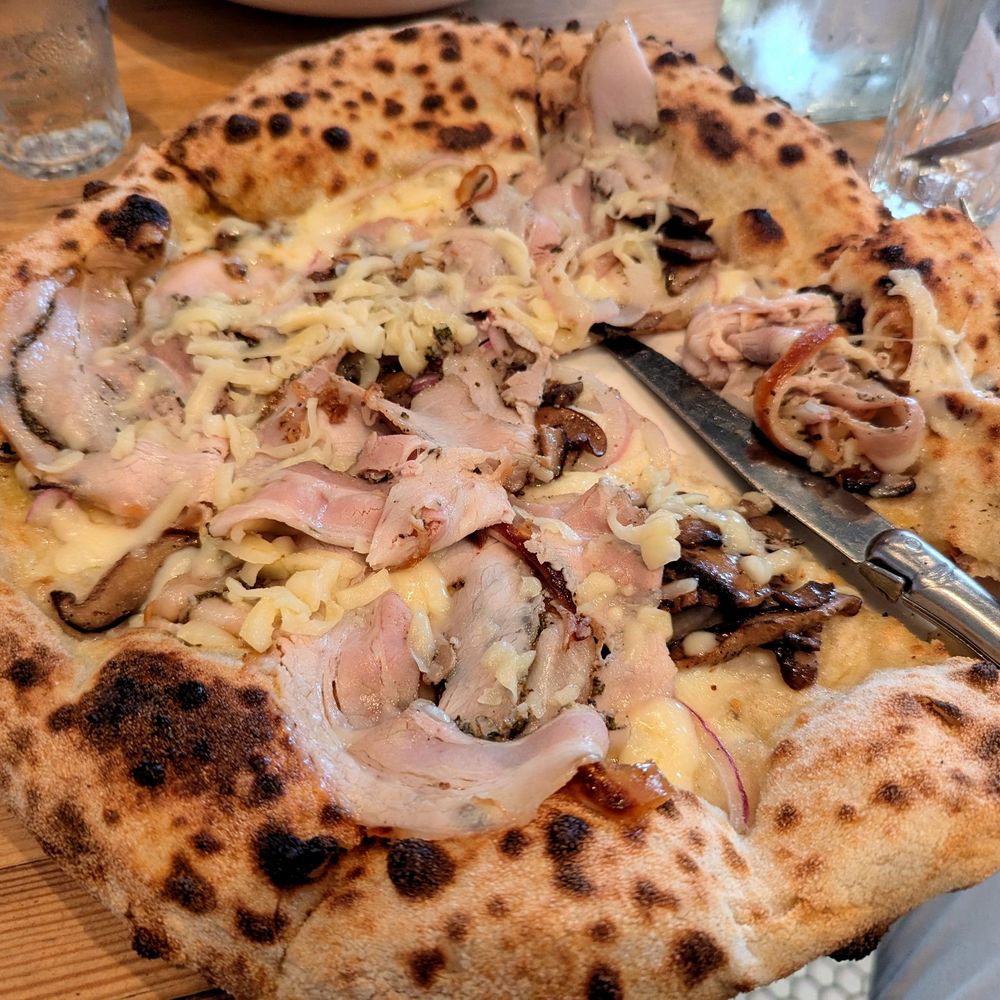 Norma - Funghi,Trifolati, & Porchetta Pizza. The porchetta is tender and delicious and the flavors are outstanding (warning: very cheesy) - Italian Near Me - New York, New York Norma - Funghi,Trifolati, & Porchetta Pizza. The porchetta is tender and delicious and the flavors are outstanding (warning: very cheesy) - Italian Near Me - New York, New York
