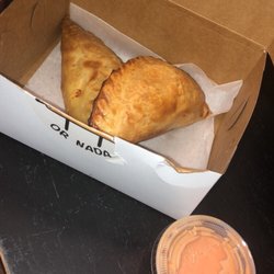 Empanada or Nada - Buffalo chicken and Chorizo and Potato empanadas with their house sauce.