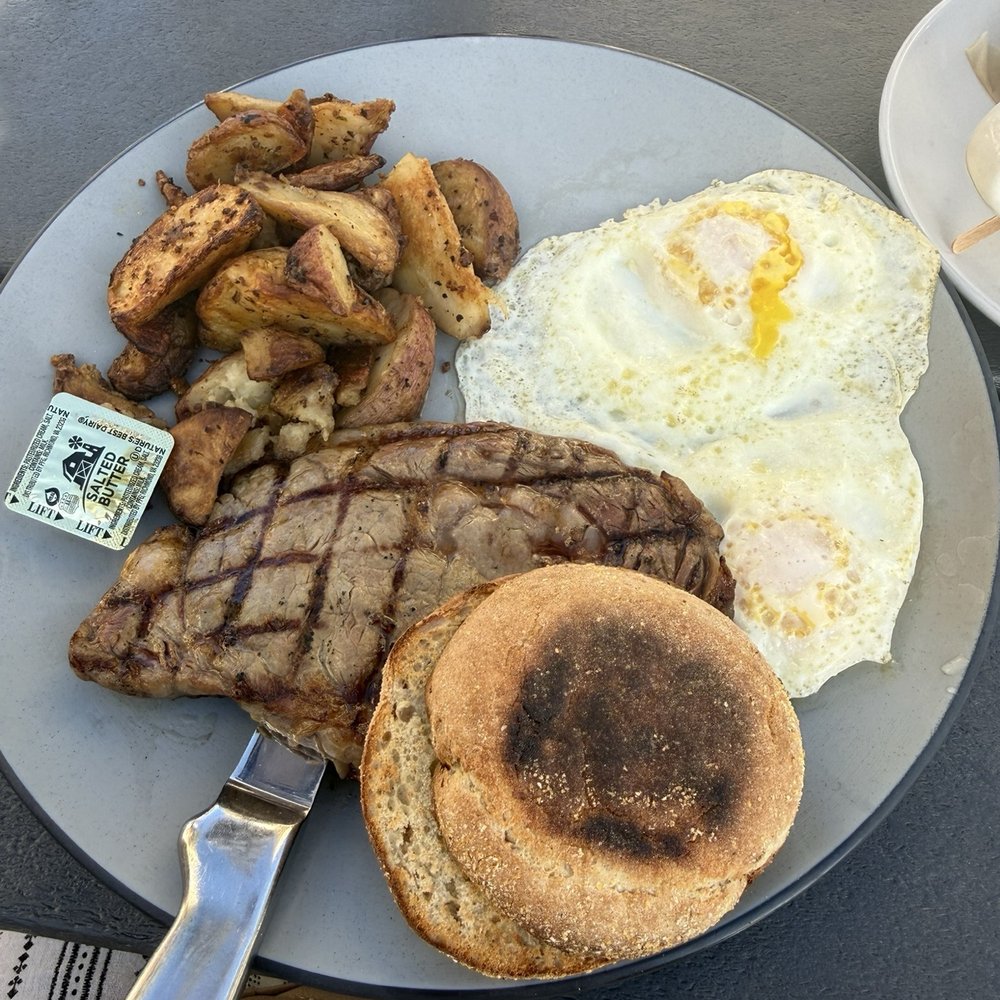 Clear Sky Cafe - Steak and eggs. Steak could have used some seasoning but it was cooked to my liking. - New American Near Me - Clearwater, Florida