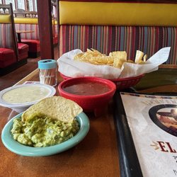 Guacamole, cheese dip and house salsa and chips