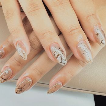 Adore Nail Studio - Vy knocked it out of the park with this cateye design with gold details - Nail Salons Near Me - Houston, Texas