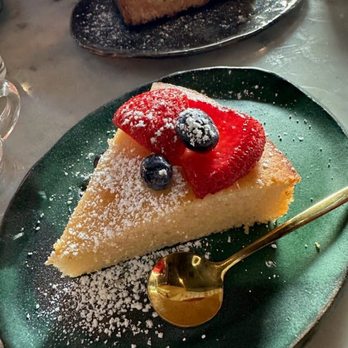 Ivy Café - Lemon olive oil cake. Not as lemony as we'd like but delicate, fresh and well presented. - Coffee & Tea Near Me - Clayton, Missouri Ivy Café - Lemon olive oil cake. Not as lemony as we'd like but delicate, fresh and well presented. - Coffee & Tea Near Me - Clayton, Missouri