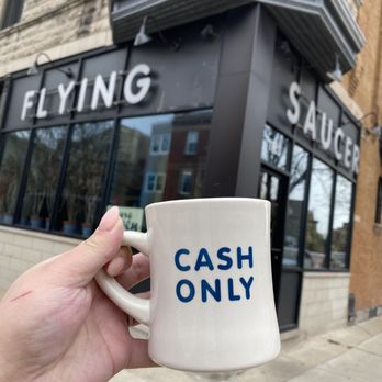 Flying Saucer - a person holding a coffee mug - Breakfast & Brunch Near Me - Chicago, Illinois Flying Saucer - a person holding a coffee mug - Breakfast & Brunch Near Me - Chicago, Illinois