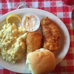 Kow Kickin' Cafe - Two piece haddock dinner with potato salad and fresh, homemade dinner roll. Served with salad, coleslaw or soup. Served hot!