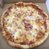 Photo of Razzo's Pizza and Salads - Oakland, CA, United States. Medium Hawaiian (8 slices) nice and meaty and cheesy.