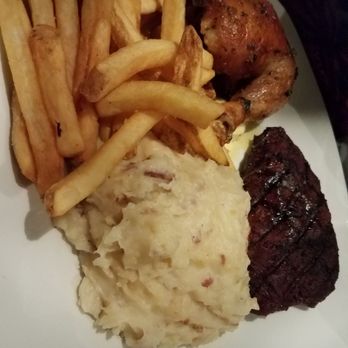 Rainforest Cafe - Steak and Rotisserie Chicken Combo. - American Near Me - Galveston, Texas Rainforest Cafe - Steak and Rotisserie Chicken Combo. - American Near Me - Galveston, Texas