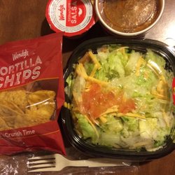 Wendy's - I ordered the taco salad BECAUSE it looked so good on the menu board. This is what I got. Never again.