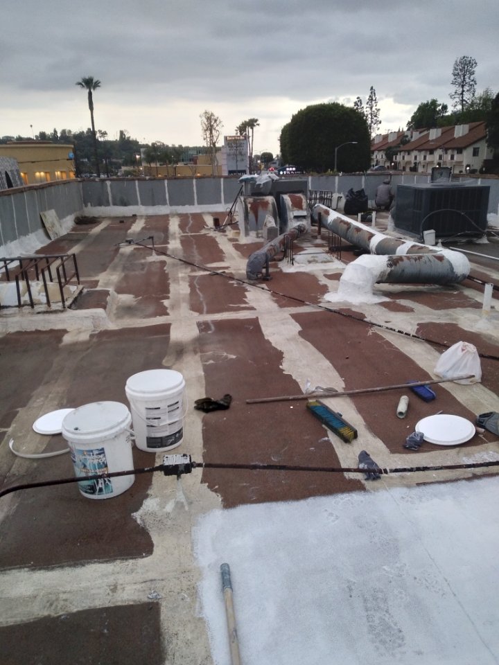 Slide of RR Roofing Service