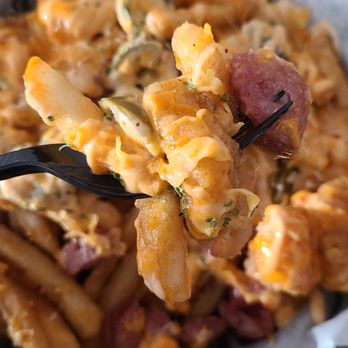 K & D Seafood - Crazy Fries - French fries,  fried popcorn shrimp, sausage bites,  jalapeno peppers and boom boom sauce. - Seafood Markets Near Me - Mobile, Alabama