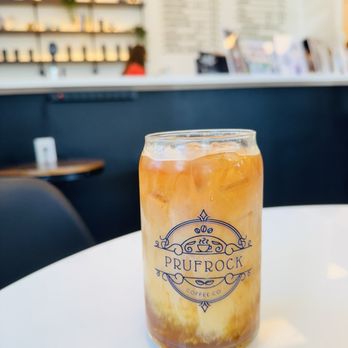 Prufrock Coffee - Caramel iced americano. - Coffee & Tea Near Me - Carmel, Indiana Prufrock Coffee - Caramel iced americano. - Coffee & Tea Near Me - Carmel, Indiana