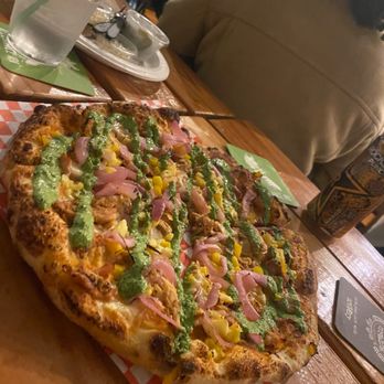 Bravery Brewing - Pizza of the month with the pesto drizzle. - Breweries Near Me - Lancaster, California