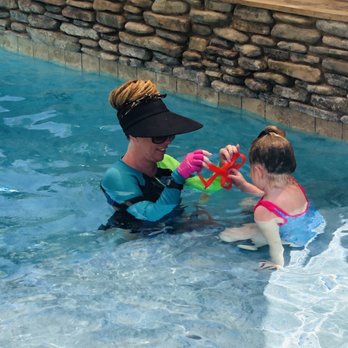 SoCal Water Babies - Receiving her graduation medal - Swimming Lessons/Schools Near Me - Riverside, California