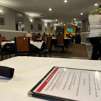 Caldeiras Restaurant - a menu on a table - Portuguese Near Me - Fall River, Massachusetts