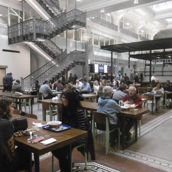 The Bourse  - Largest eating area - actually it's not that large.  Surrounding you is a sea of numbing white painted walls and fixtures. - Public Markets Near Me - Philadelphia, Pennsylvania
