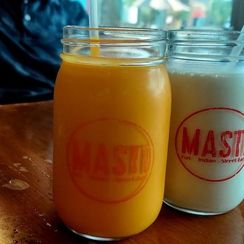 Masti Indian Street Eats - Left - Mango Lassi, right - milk - Indian Near Me - Duluth, Georgia