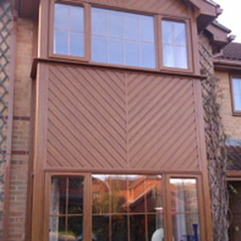 Falcon Windows - light oak square bay windows with ship lap cladding and fascias and soffits - Windows Installation Near Me - Ipswich, SFK Falcon Windows - light oak square bay windows with ship lap cladding and fascias and soffits - Windows Installation Near Me - Ipswich, SFK