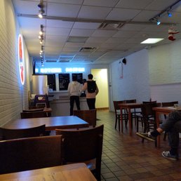 Menu behind the counter. Old business that left still has their sign up outside Menu behind the counter. Old business that left still has their sign up outside