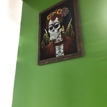 La Catrina Restaurant - a painting of a skeleton on a green wall - Mexican Near Me - Los Angeles, California La Catrina Restaurant - a painting of a skeleton on a green wall - Mexican Near Me - Los Angeles, California
