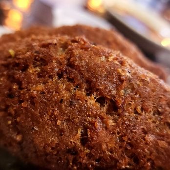 Jerusalem Grill - Kibbeh 2 Piece. Nice texture. Crunchy. To me, a little dry, but the yogurt dip that came with was a  perfect addition. - Mediterranean Near Me - San Antonio, Texas