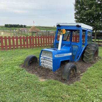 Country Barn - a tractor in the mud - Fruits & Veggies Near Me - Lancaster, Pennsylvania