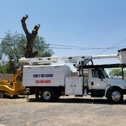 Terry's Tree Service - New bucket truck work chipper