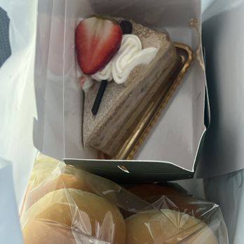 Tous Les Jours - Mocha Cloud Cake and Milk Rolls - Bakeries Near Me - Annandale, Virginia Tous Les Jours - Mocha Cloud Cake and Milk Rolls - Bakeries Near Me - Annandale, Virginia