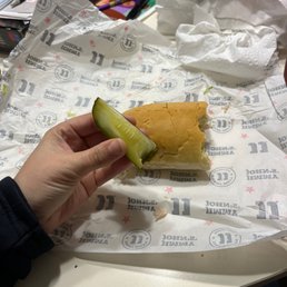 a person eating a sandwich