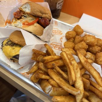 Proudly Serving - Fries, tots, PS burger, and a collaboration burger (no longer available) - Burgers Near Me - Long Beach, California