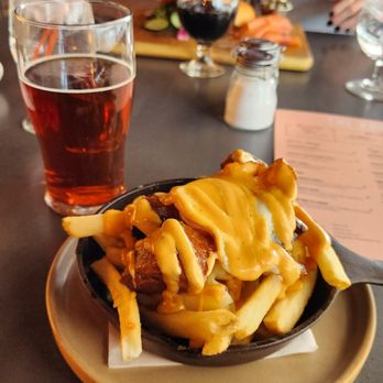 The Front Yard - Fries and shine. A pork belly steak fries bourbon BBQ and fried egg amazing concoction - Beer Gardens Near Me - Las Vegas, Nevada