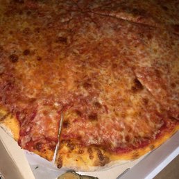 Regular Pizza Pie with a little surprise garlic knot