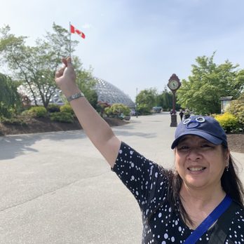 Bloedel Conservatory - Conservatory in the back with Canadian Flag - Botanical Gardens Near Me - Vancouver, British Columbia
