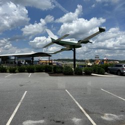 Takeoff Mini Golf - Parking lot / Main entrance over looking nearby playground and airport