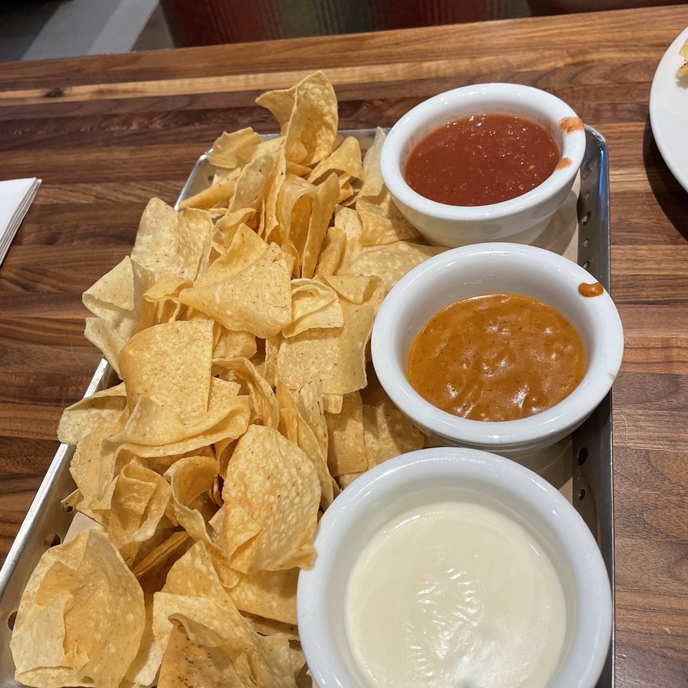 Chili's - 11-13-2022 - Dip Trio the original Skillet Queso, queso blanco and salsa. Bottomless chips - American Near Me - Plano, Texas Chili's - 11-13-2022 - Dip Trio the original Skillet Queso, queso blanco and salsa. Bottomless chips - American Near Me - Plano, Texas