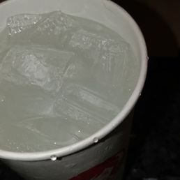 a plastic cup filled with ice a plastic cup filled with ice