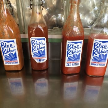 Blue Ribbon BBQ - Assortment of sauces (to-go containers are available if you're doing take out). - Barbeque Near Me - Arlington, Massachusetts
